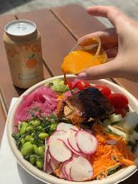 Radish signature dishes Southwest SaladHarvest BowlBuffalo Chicken Wrap